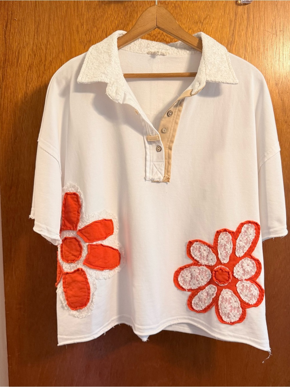 JODIFL White Polo Top with Orange Floral Appliqués